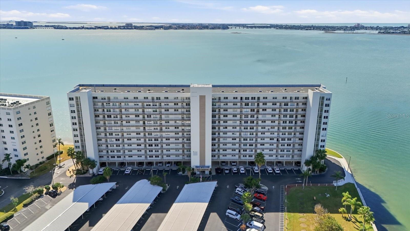 Waterfront views at Buckingham Building of Town Shores Community. Private - secured entrance with reserved parking spot and plenty of visitor parking.