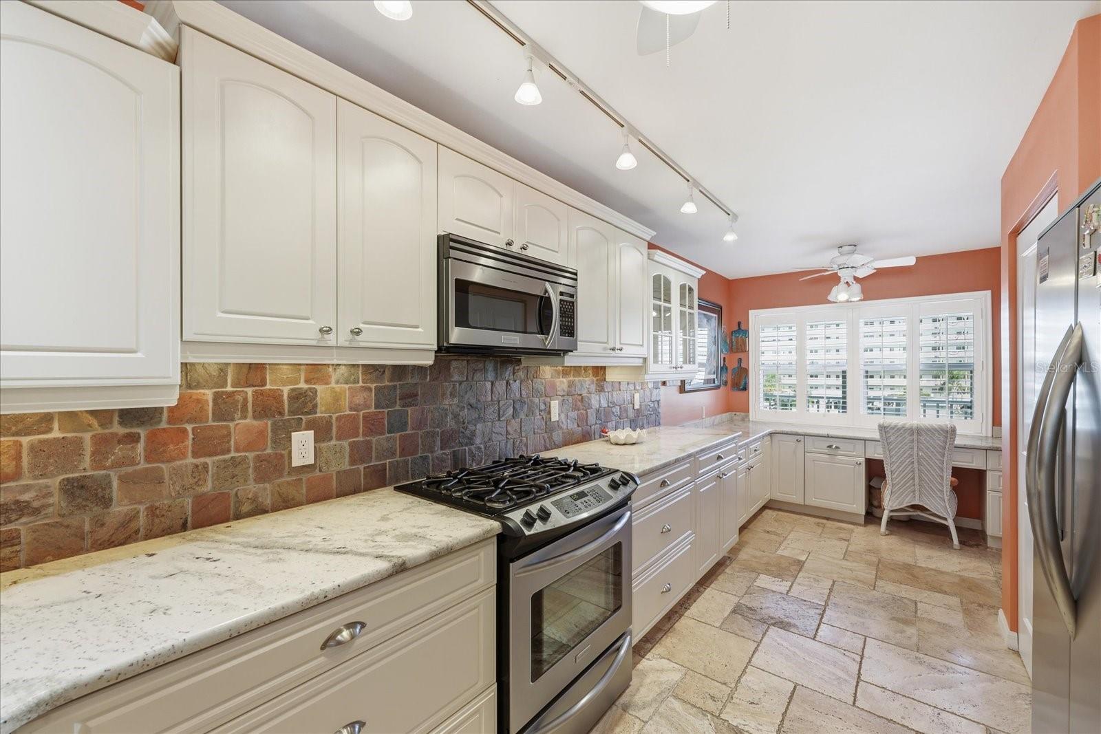 Gas & Induction Range with plenty of counter and cabinet space.