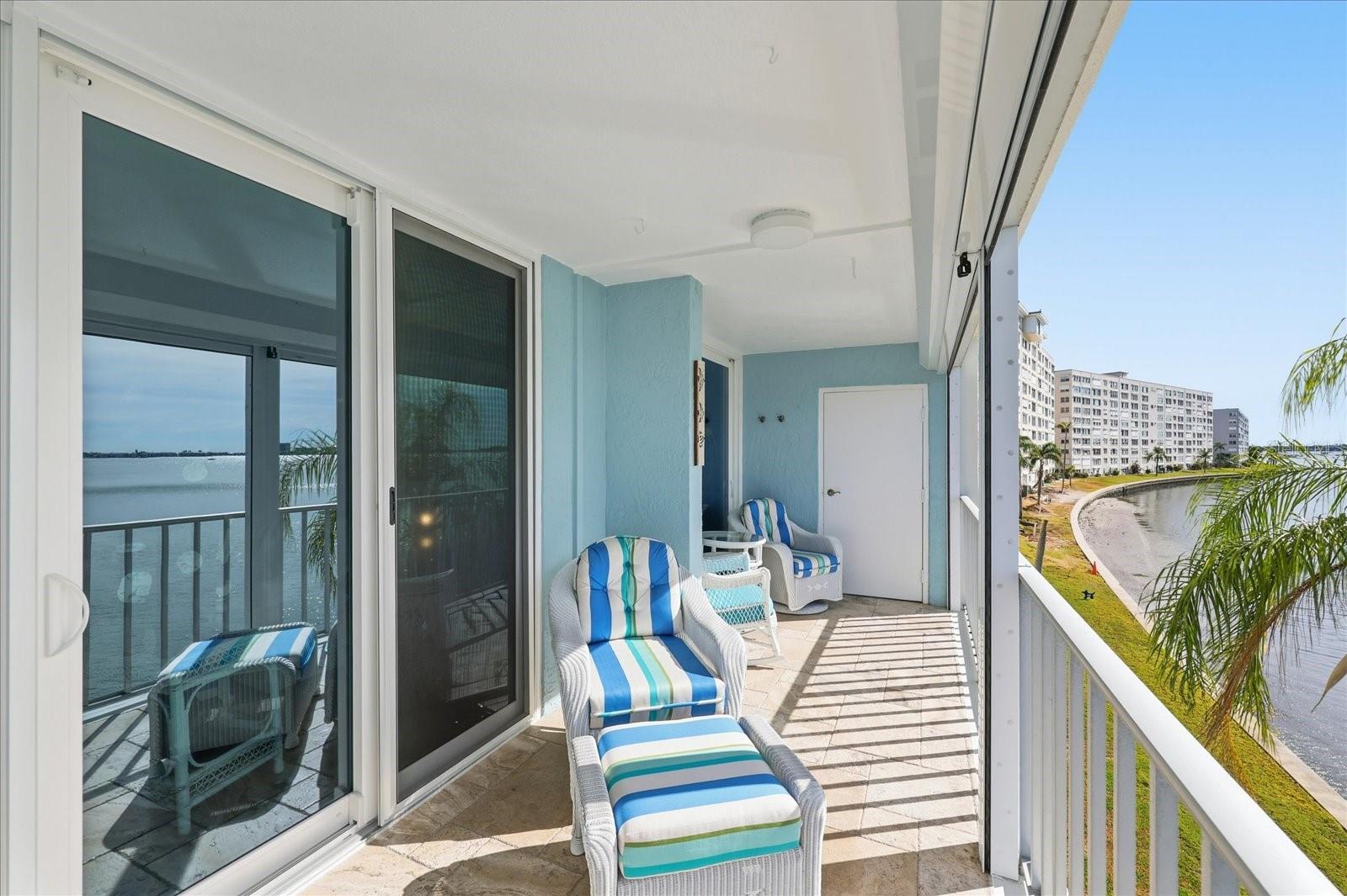 New hurricane sliding doors leading into the primary suite.