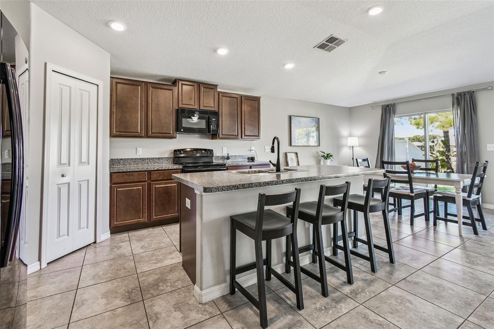 Kitchen with large island and pantry