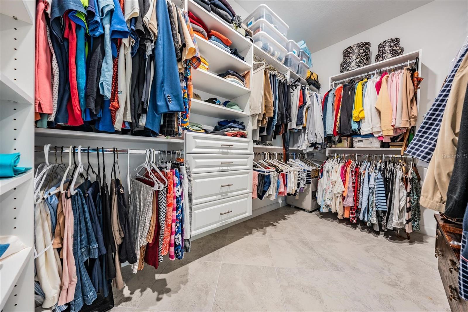 Primary Closet with Custom Closet & added electric sockets