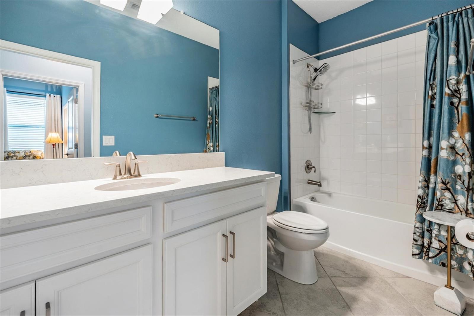 Quartz countertops and Shower/tub combo