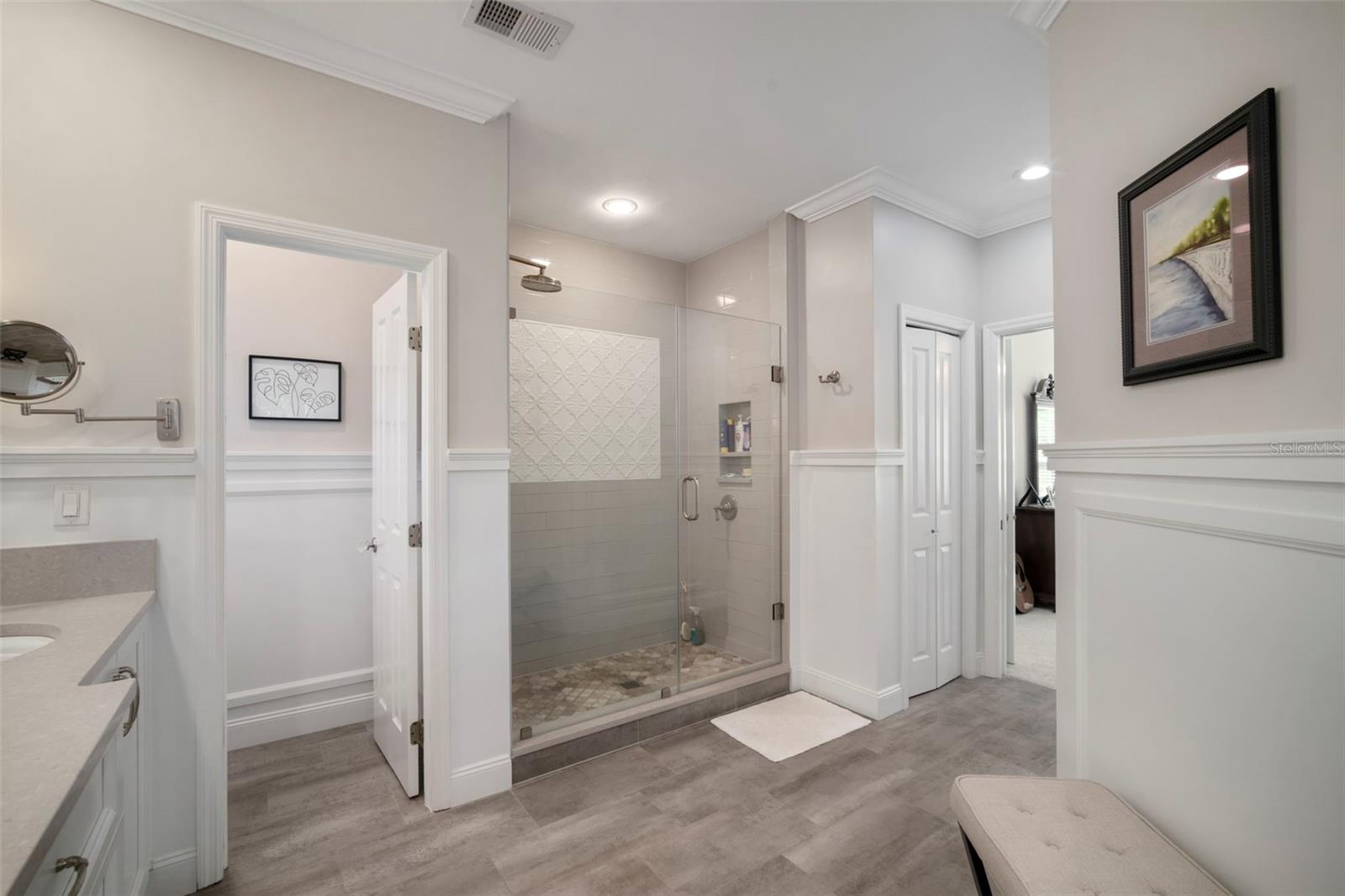 Primary Bath Looking at Walk-in Shower and Private WC