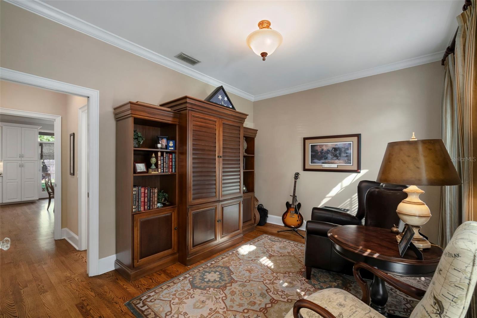 Den/Office, originally built for elderly parent, no closet but full bath just off the hallway.