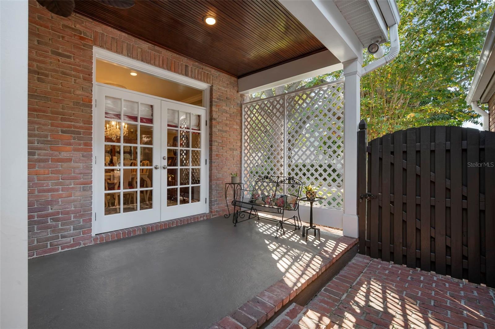 Looking at French doors from the dining area.