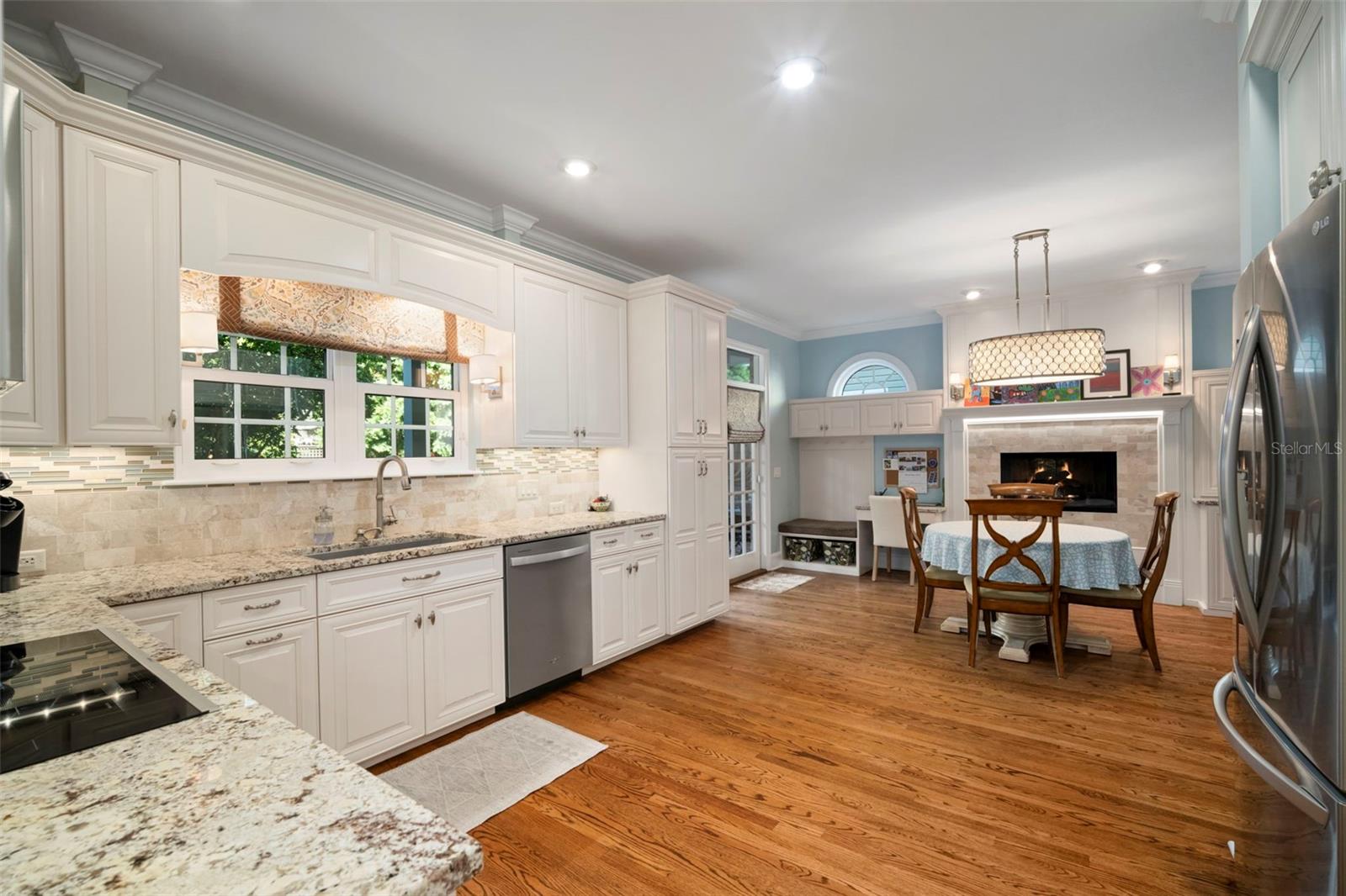Fireplace and built-ins. solid hard wood floors throughout the first floor. French doors leading to the backyard patio.