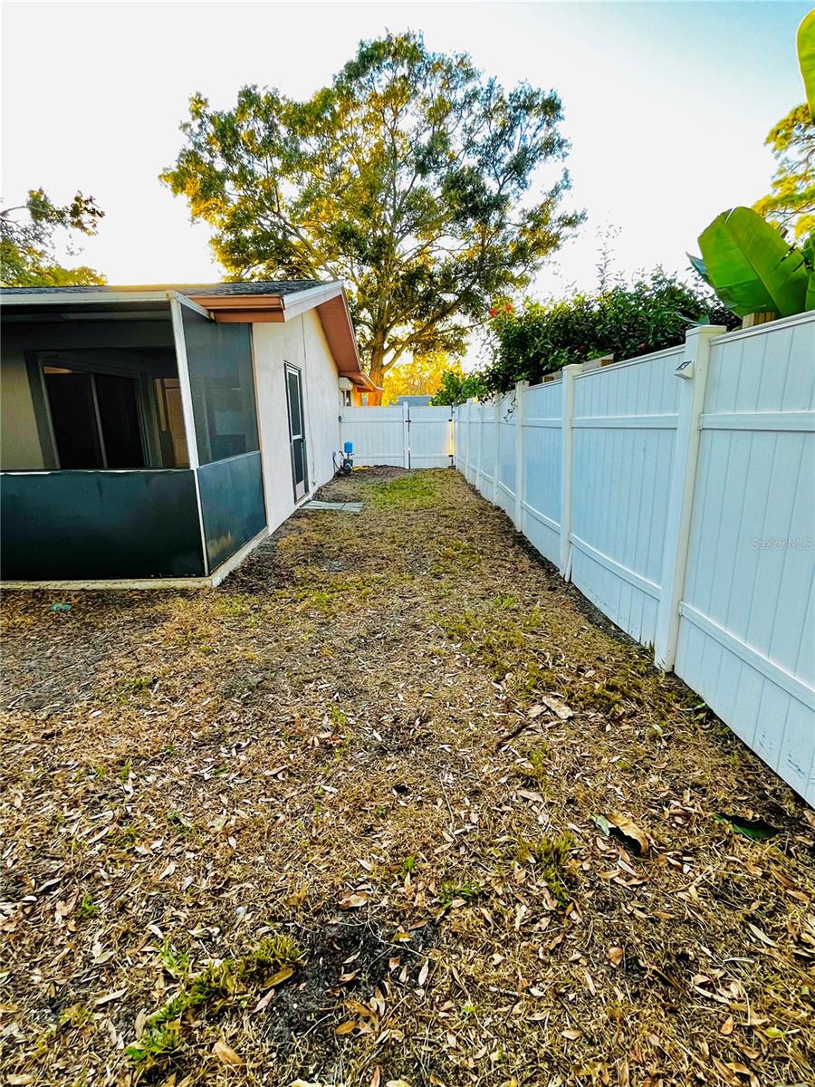EXTERIOR BACK/ FULLY FENCED