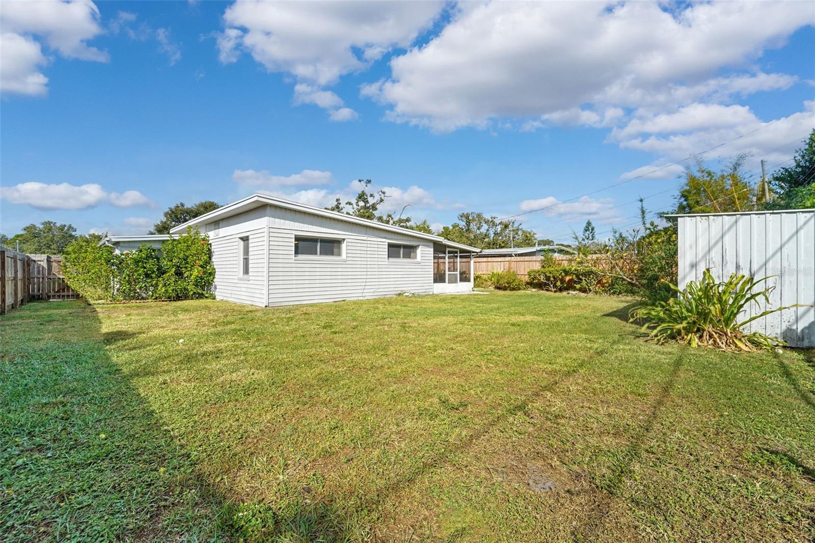 Good sized backyard with storage shed