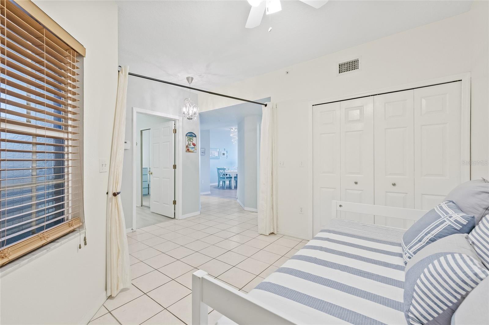 Room is perfect for a den, office or media room. Laundry is located in the closet.
