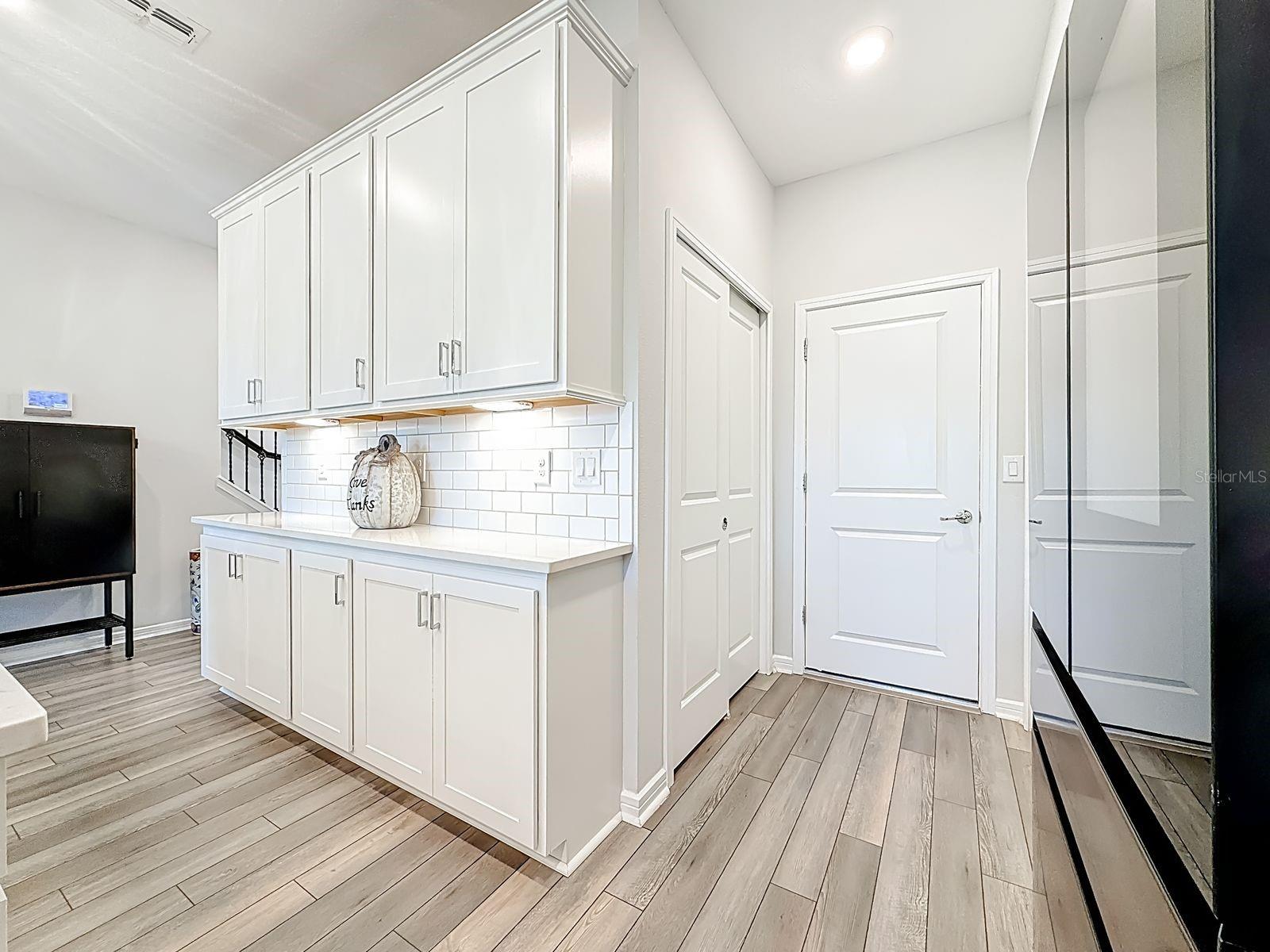 Kitchen - Dual Pantries - Garage Access