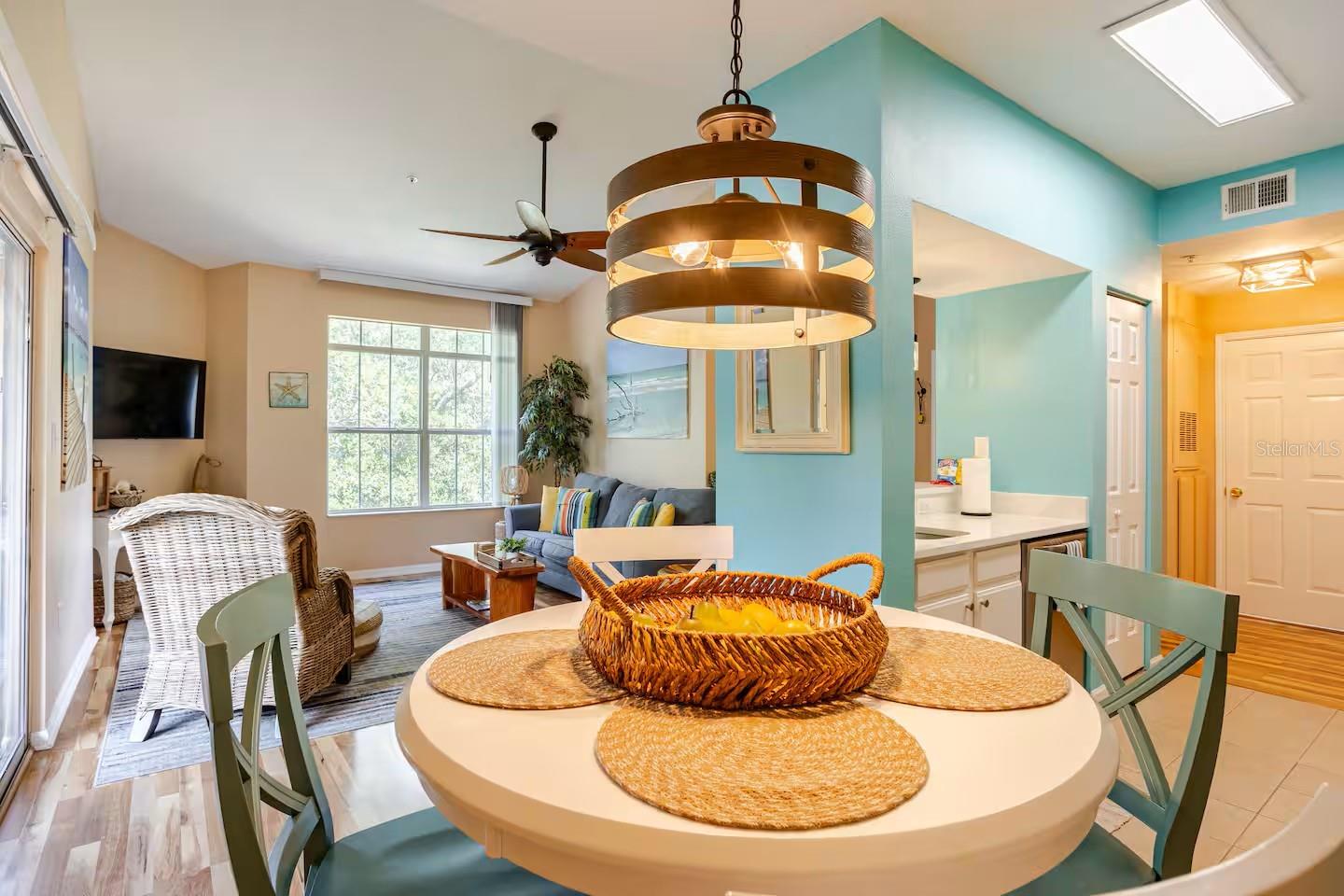 Open floor plan with vaulted ceilings feels roomy, bright and airy.