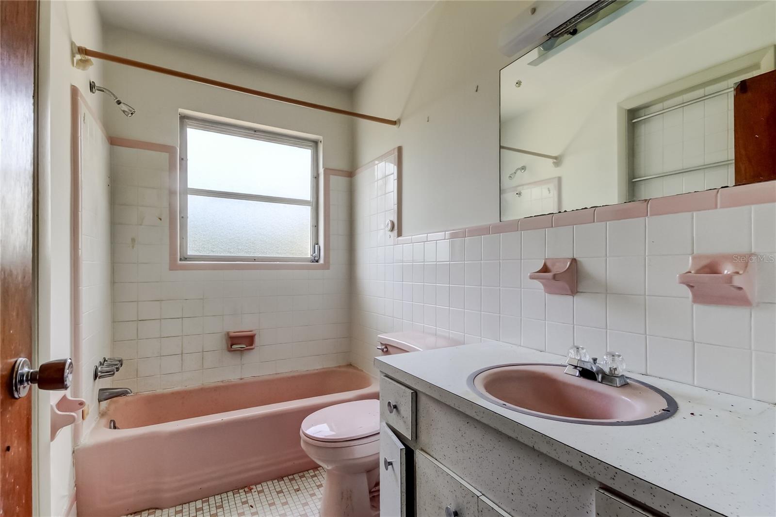 Full Bathroom is In Between the Home's 2 Bedrooms..