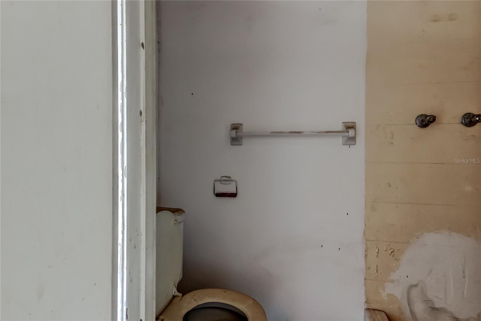 1/2 Bath in Garage is Not Likely Functional, Yet Plumbing is There!