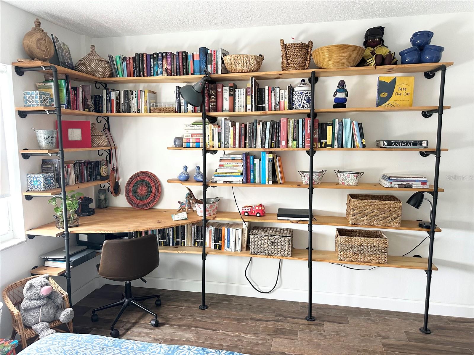 Each bedroom has a built-in desk with bookshelves