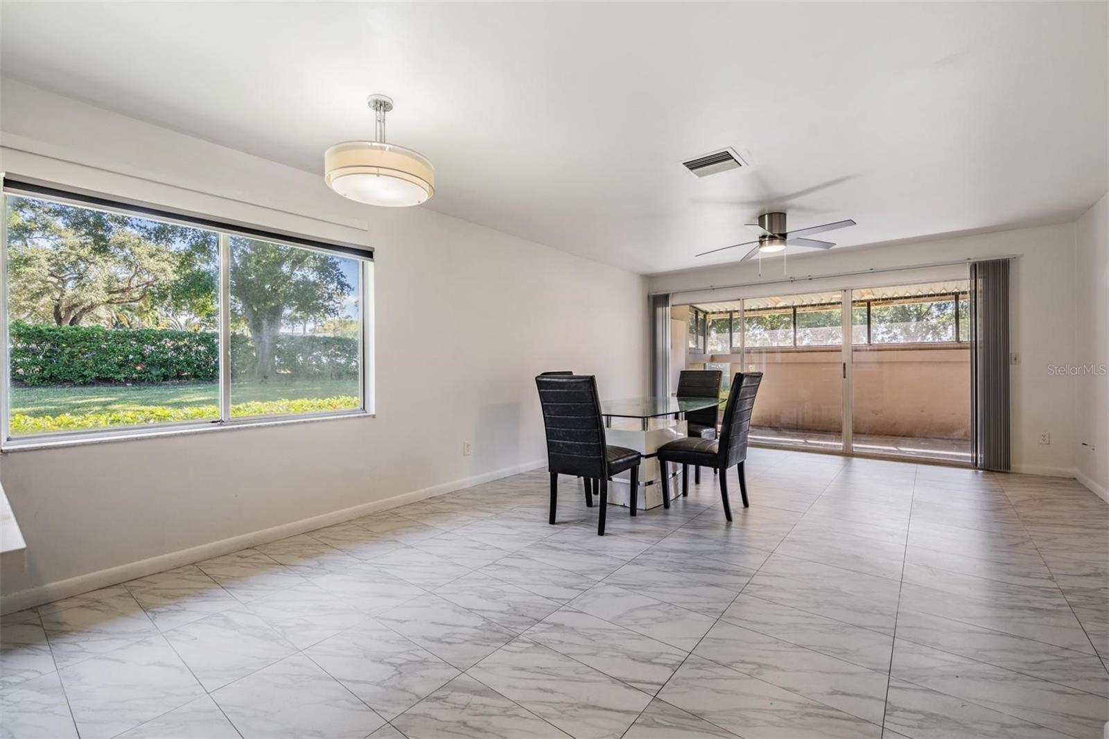 Spacious Great Room with sliding doors leading to the porch.