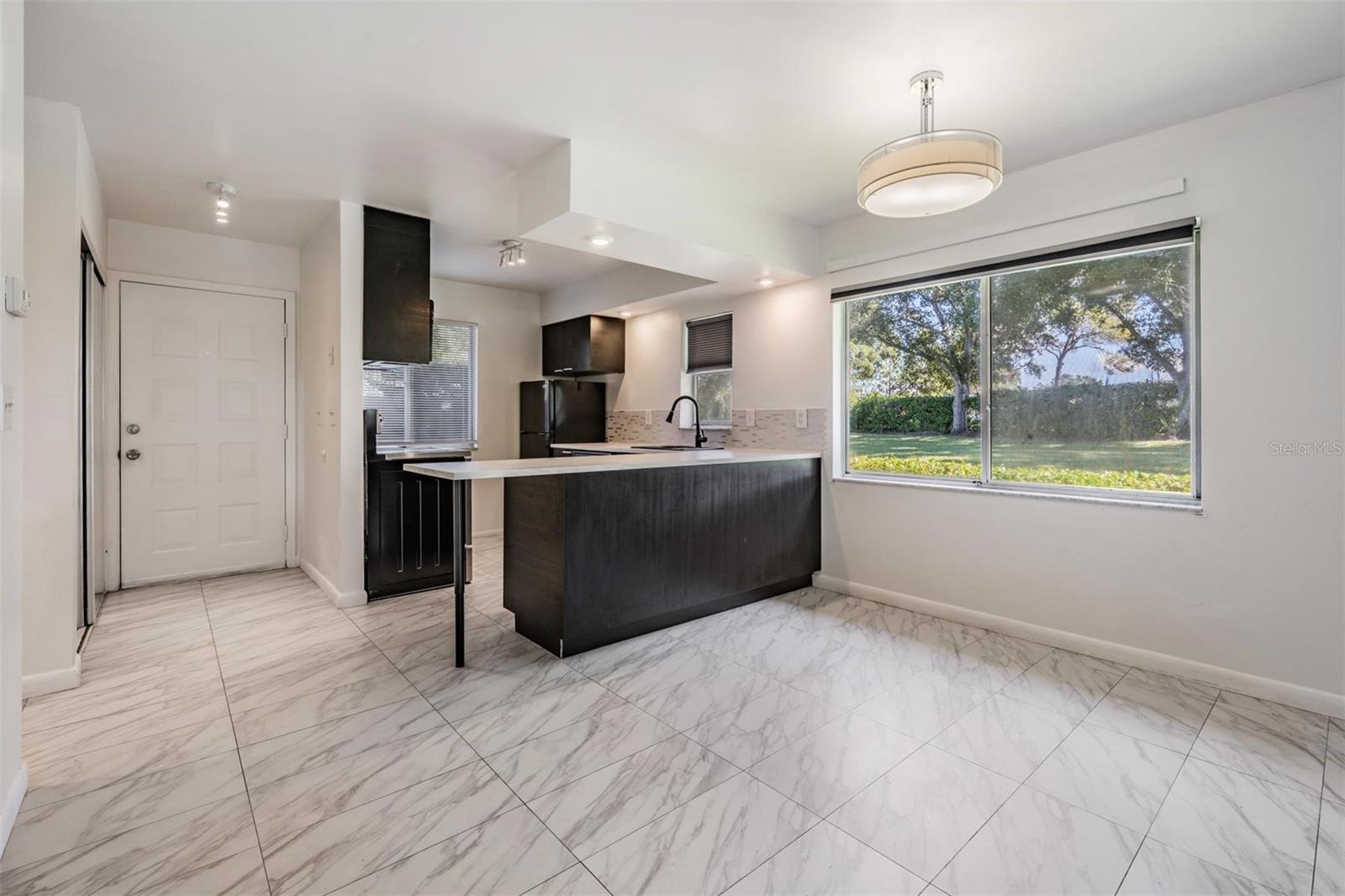 Open-concept kitchen flows seamlessly into the Great Room — perfect for entertaining.