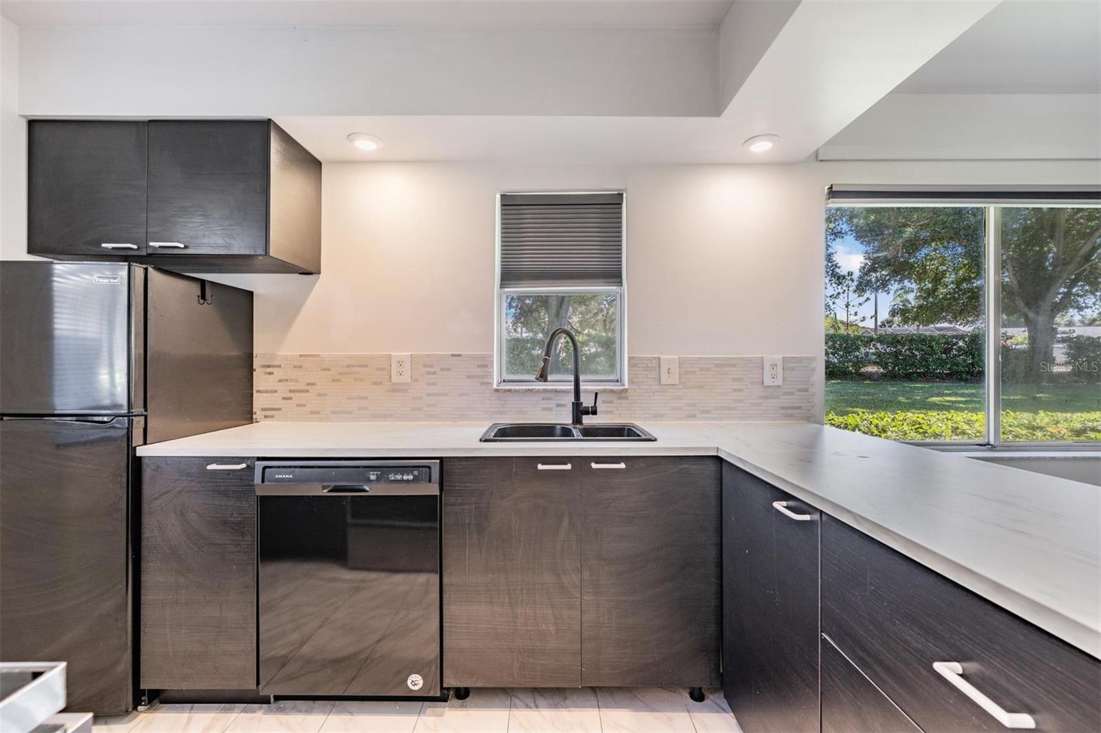 Open-concept kitchen flows seamlessly into the Great Room — perfect for entertaining.