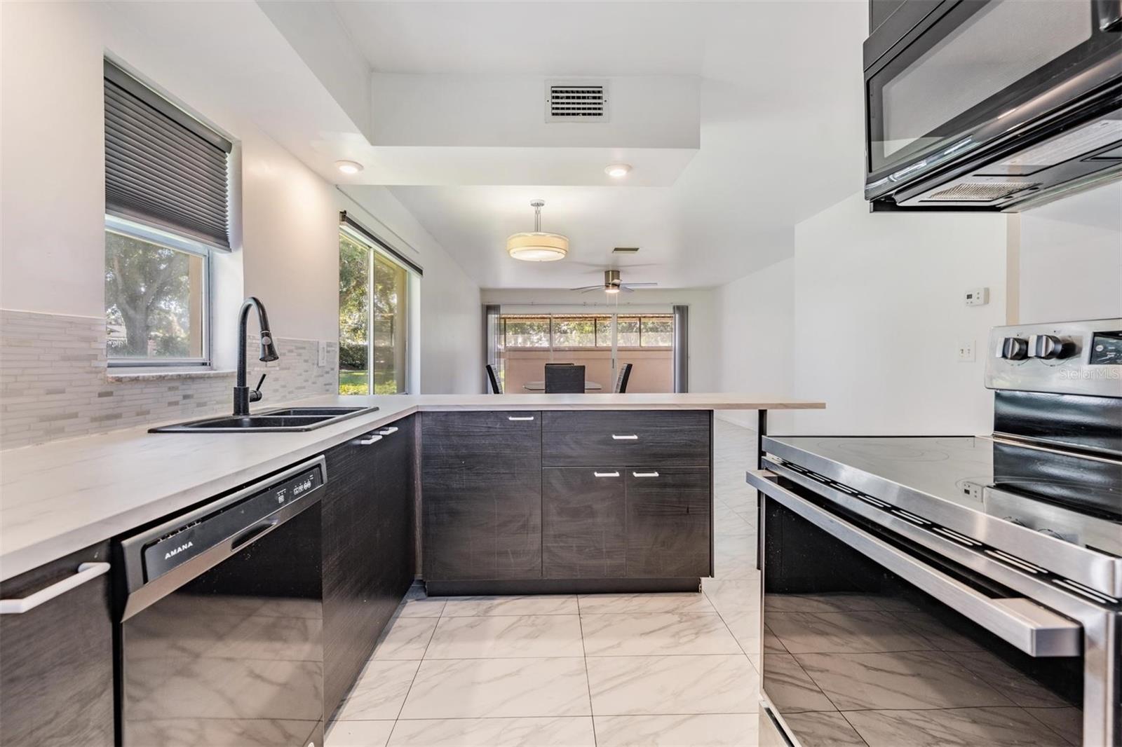 Open-concept kitchen flows seamlessly into the Great Room — perfect for entertaining.
