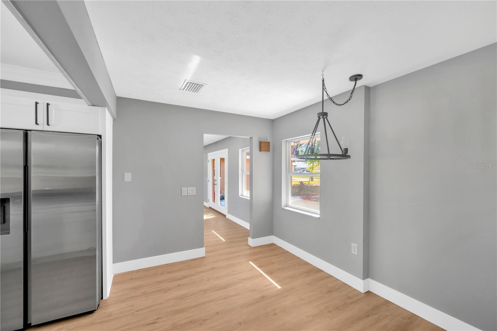Dining room into the primary living room area