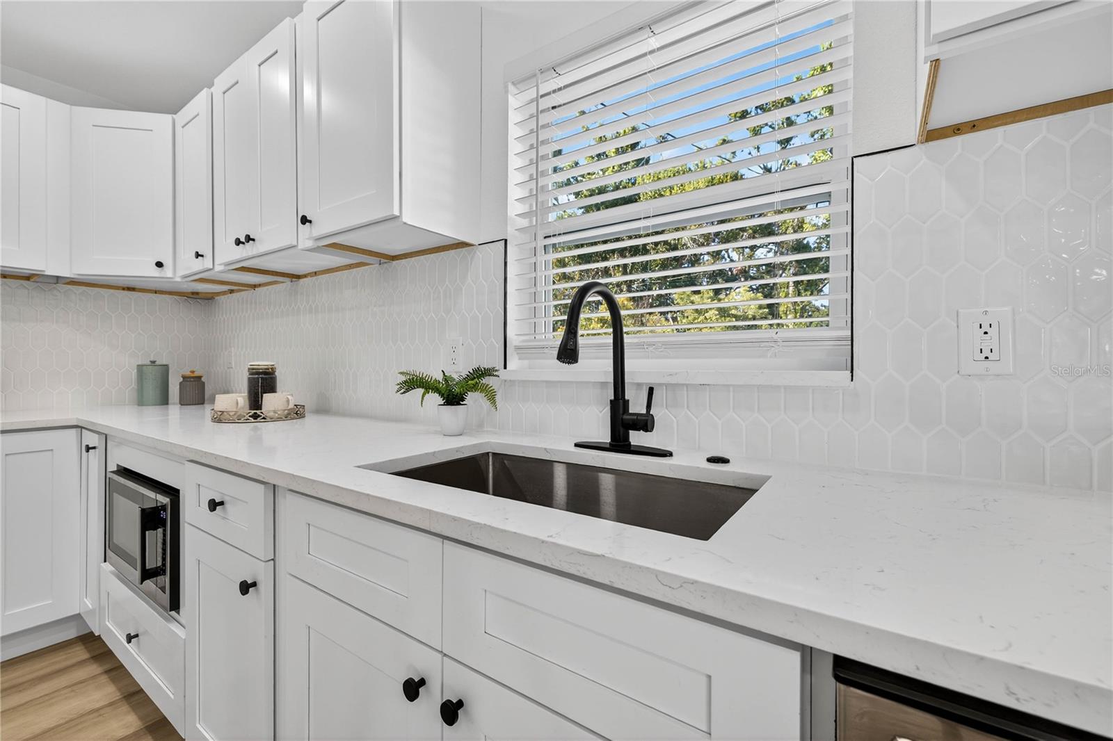 Quartz Countertops and Shaker Cabinets