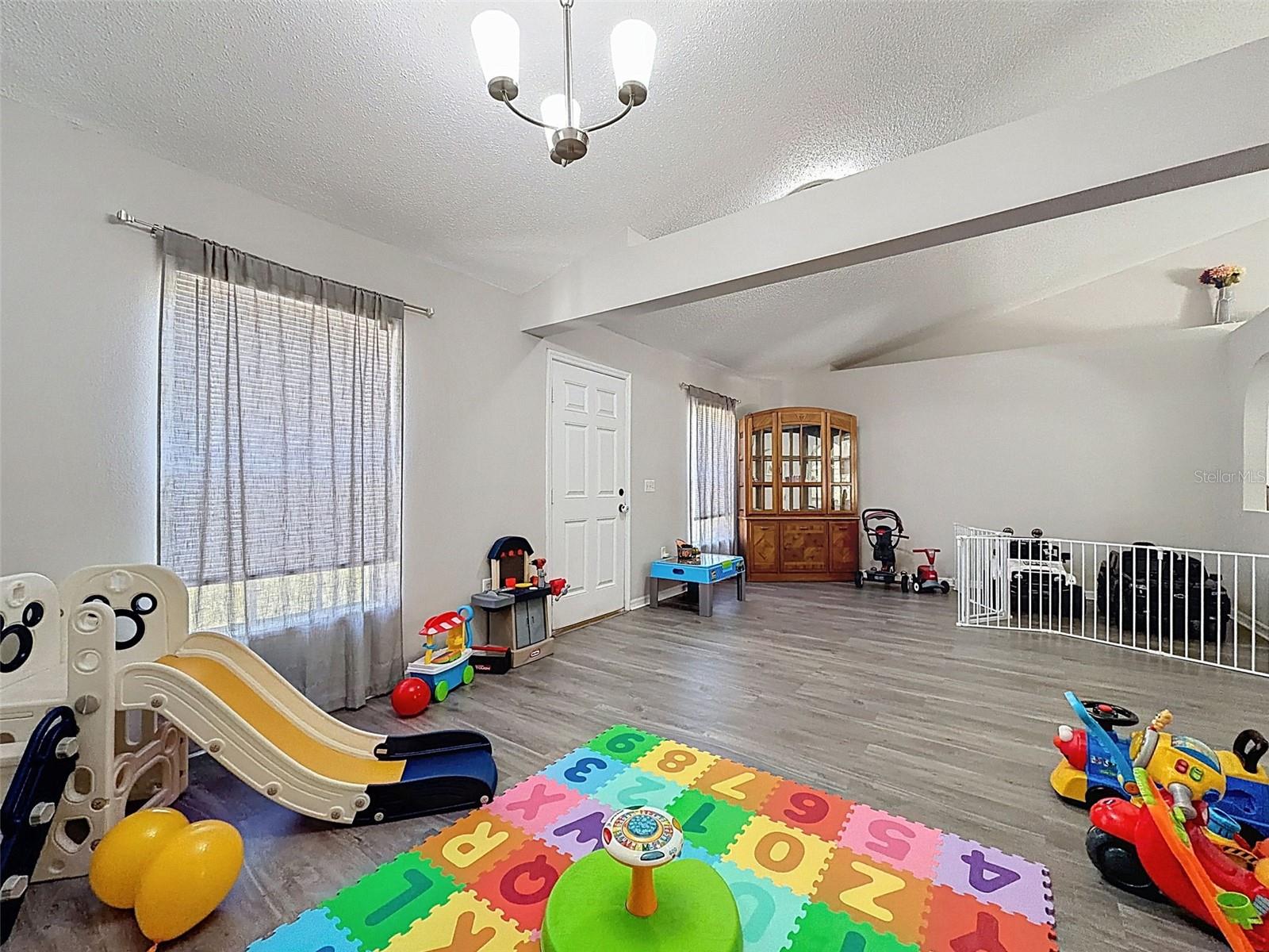 formal dining area and family room combo