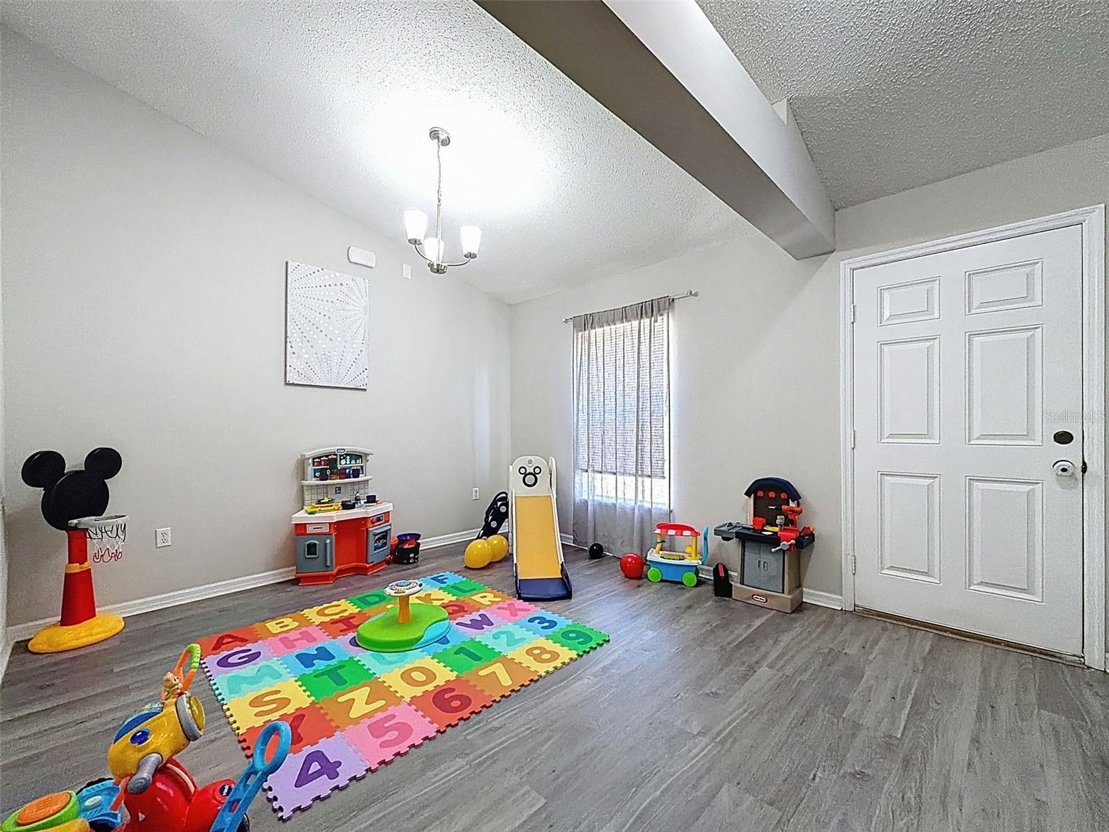 formal dining area and family room combo