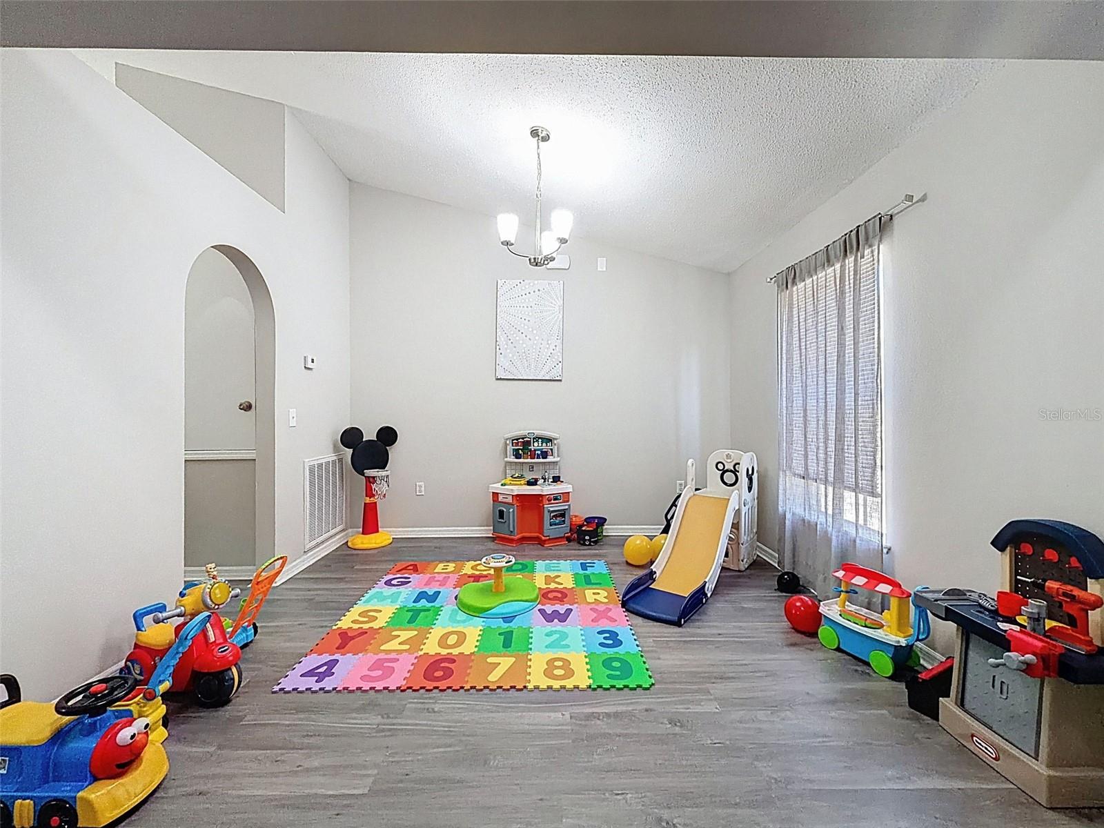 formal dining area and family room combo