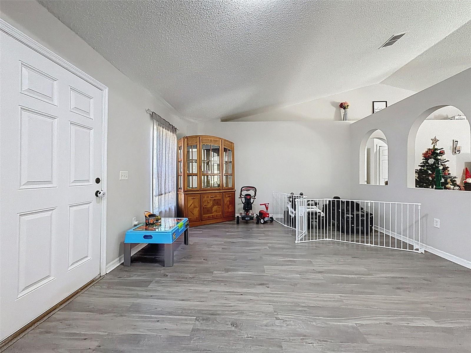formal dining area and family room combo