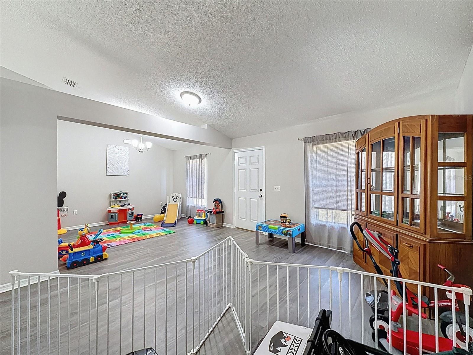 formal dining area and family room combo