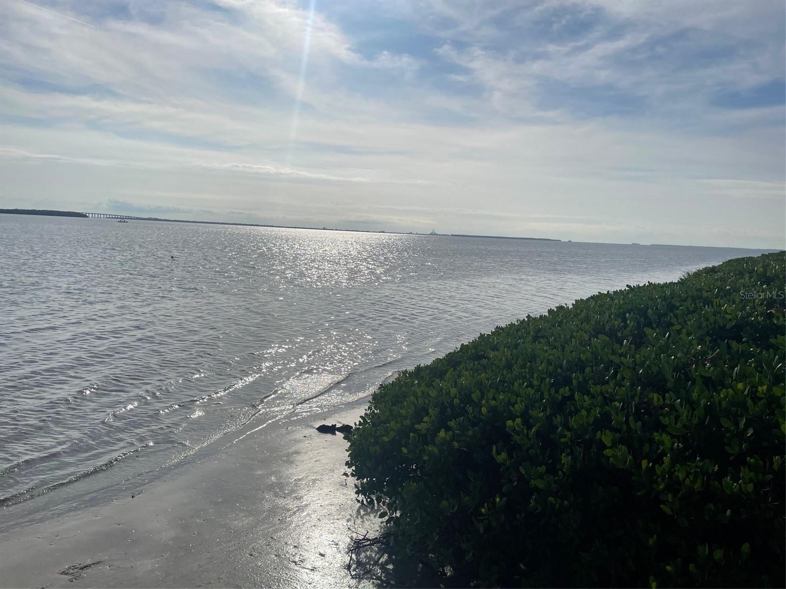 A hazy day and a glistening bay