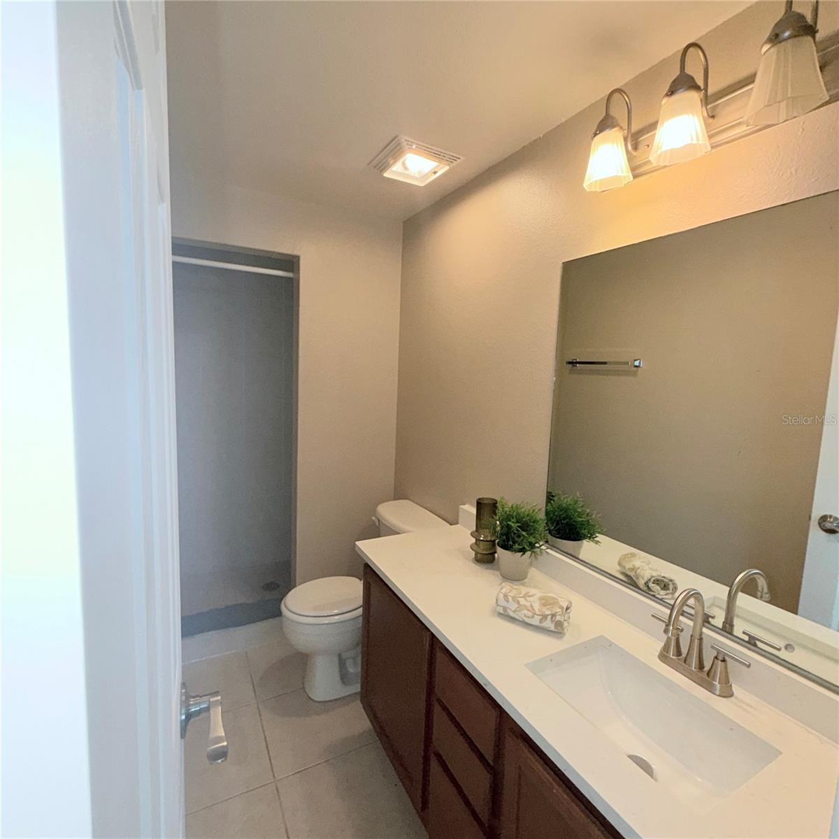 Master en suite suite, Number2 bedroom bath with stand in shower, new quartz countertops and faucets