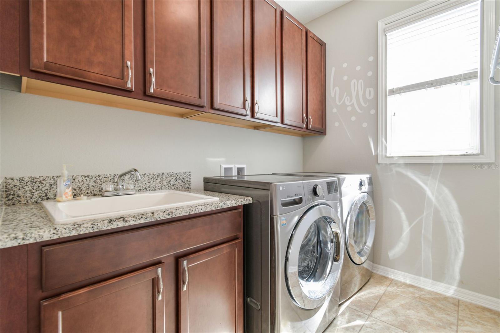 MAIN FLOOR LAUNDRY WITH SINK