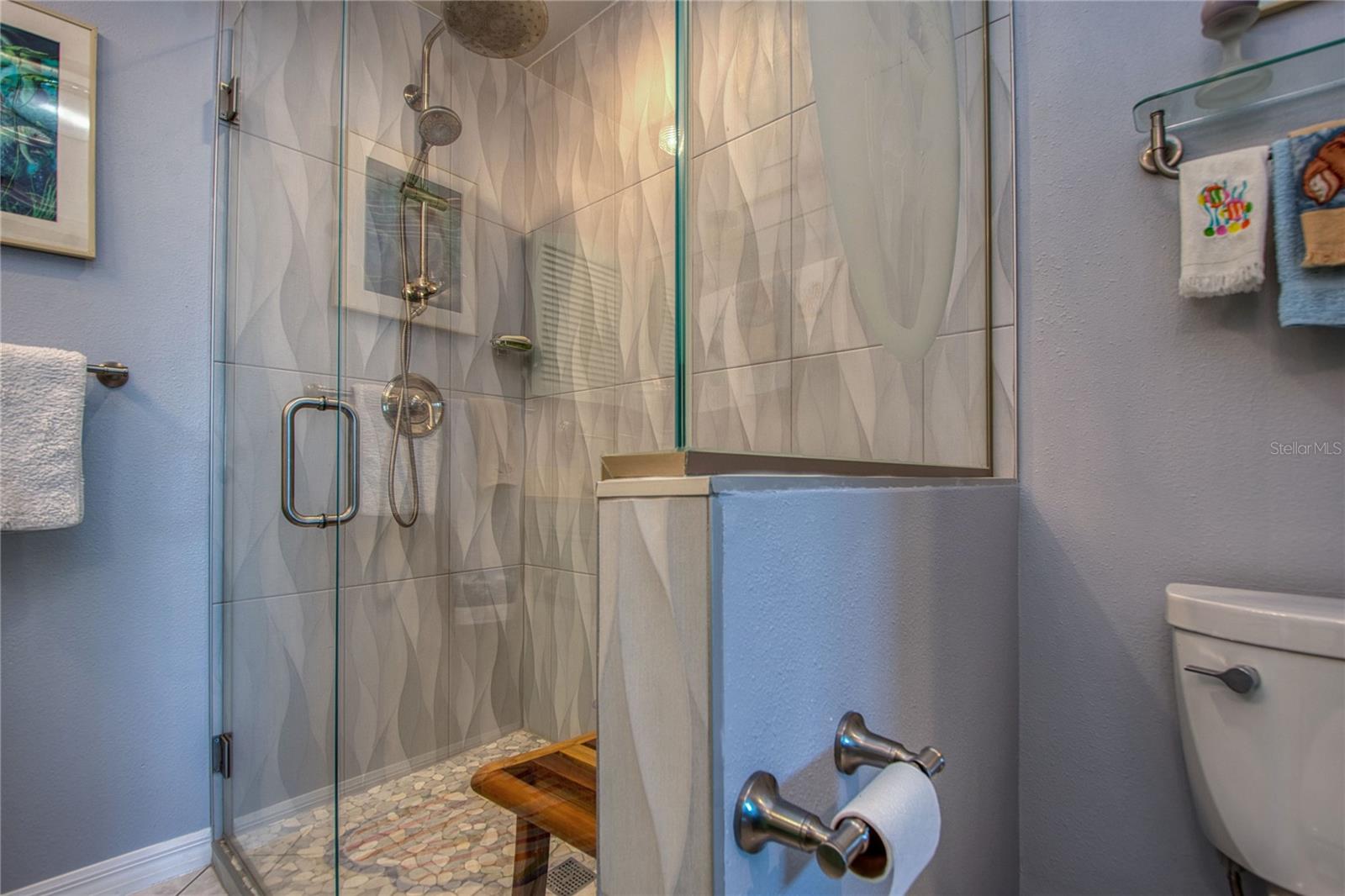 Frameless walk-in shower