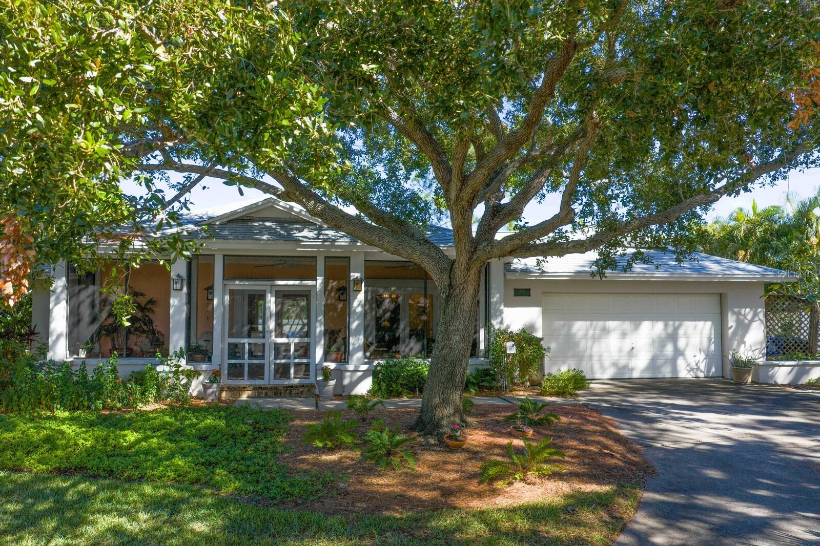 Old Florida Vibes with Impressive Screened Front Porch Entry