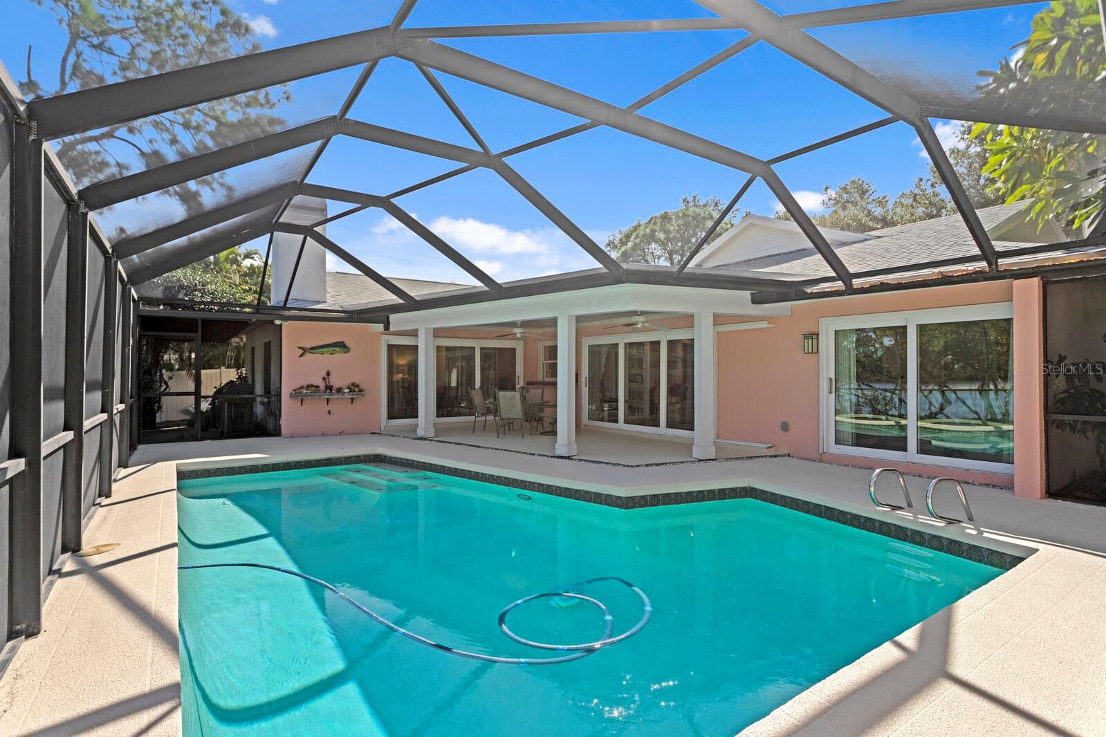 Large pool with covered patio