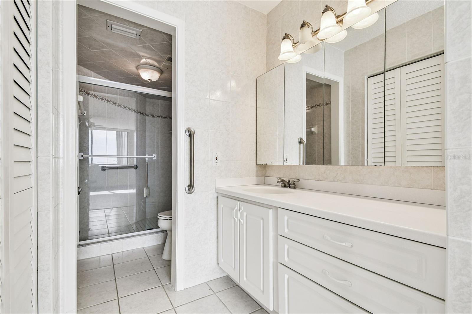 Primary bedroom bath and walk in closet