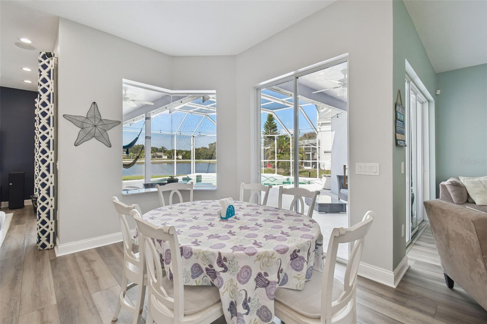Breakfast nook overlooking pool and pond