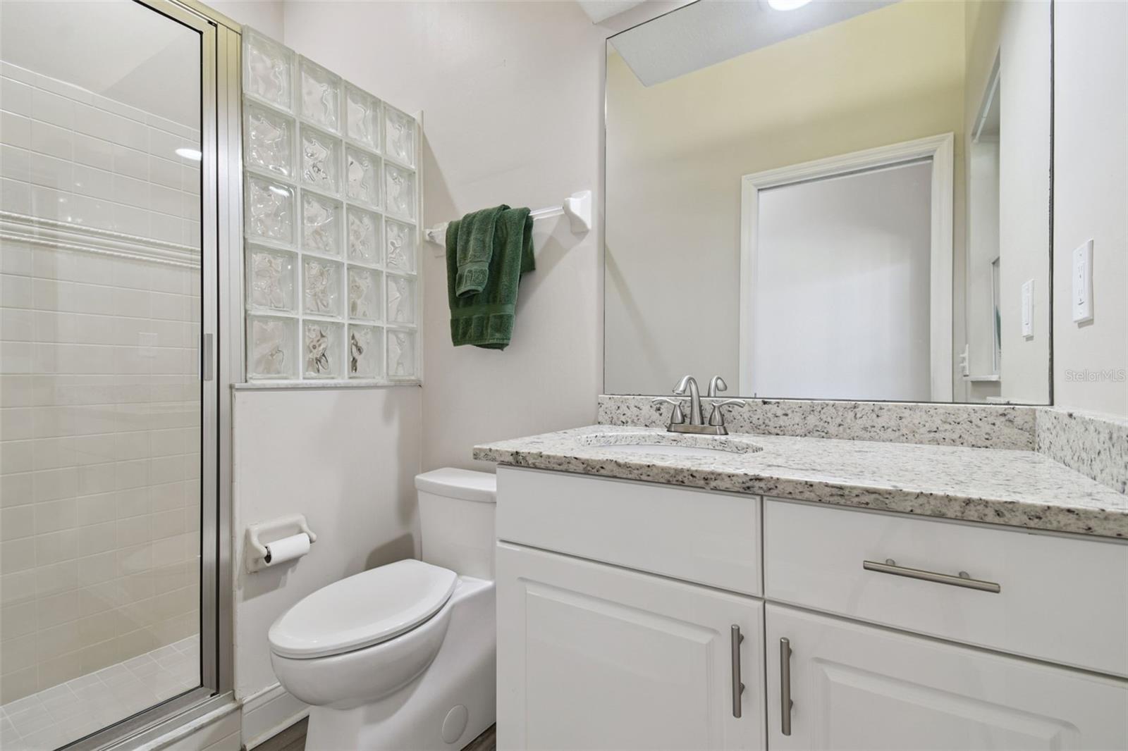 3rd Bathroom with door to pool