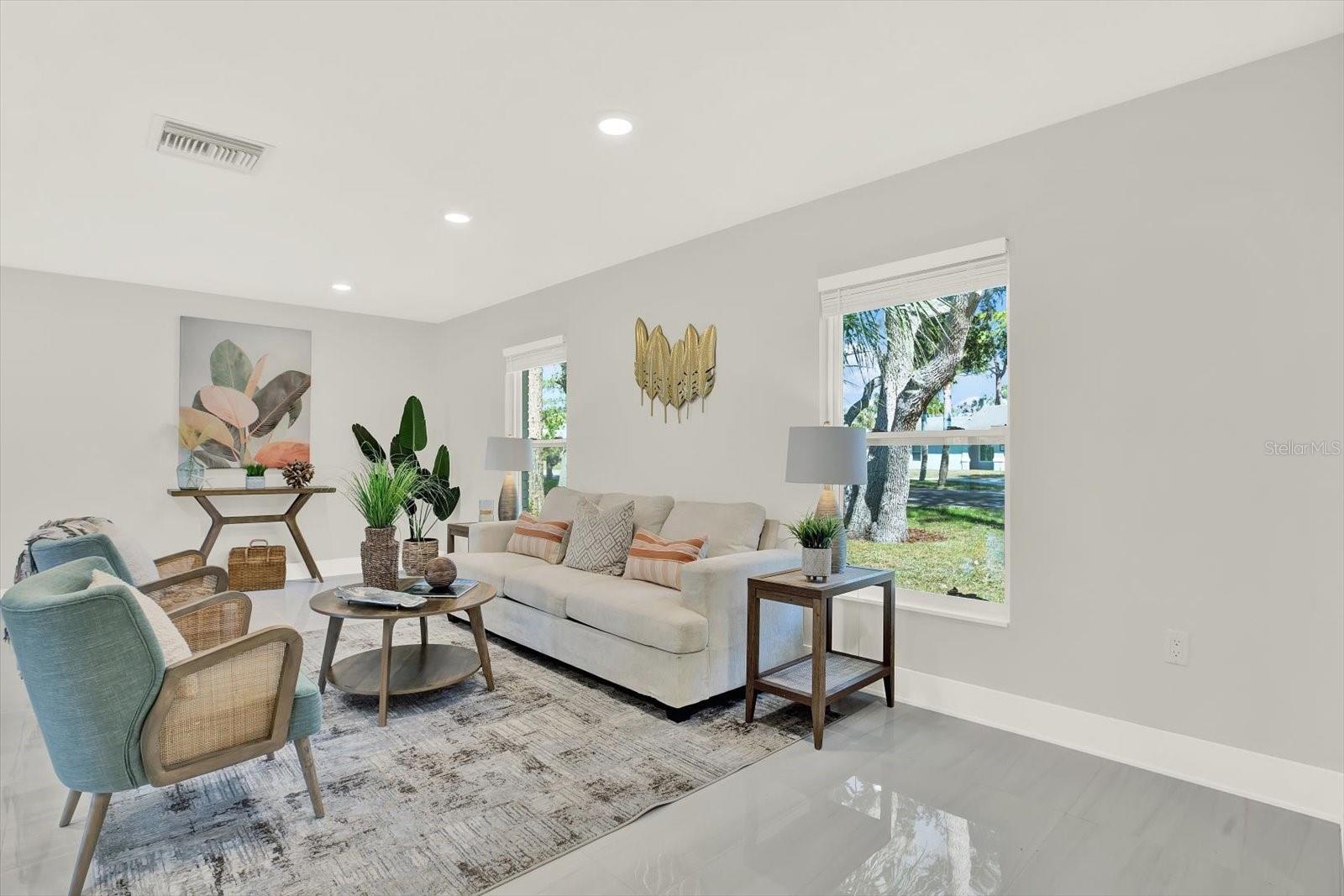 Fine porcelain tiles through out entire home. No carpet!