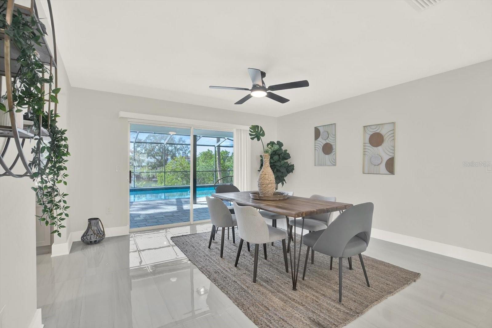 Formal Dining with slider to pool. Ideal for entertaining