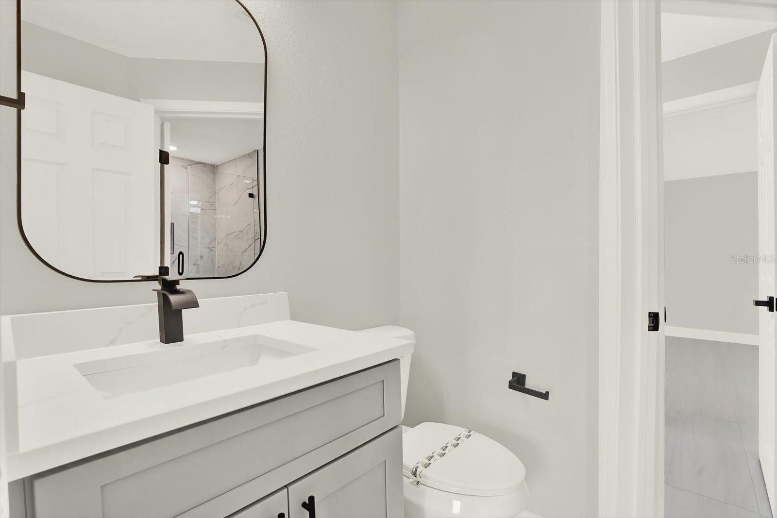 Each Jack & Jill bath has private toilet | vanity & they share a shower