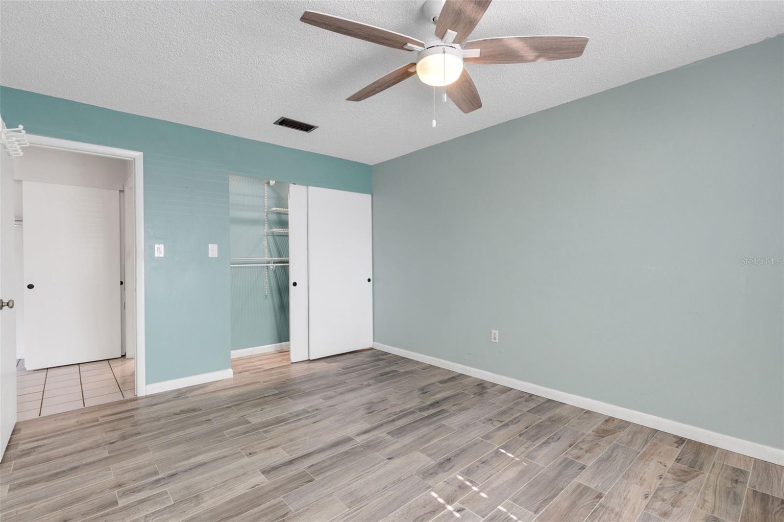 Closet with shelves and hanging space