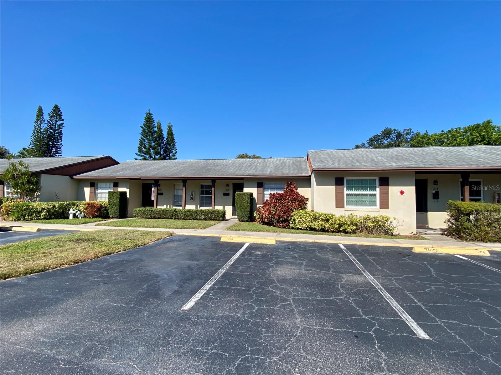 2 assisted parking spots with guest parking