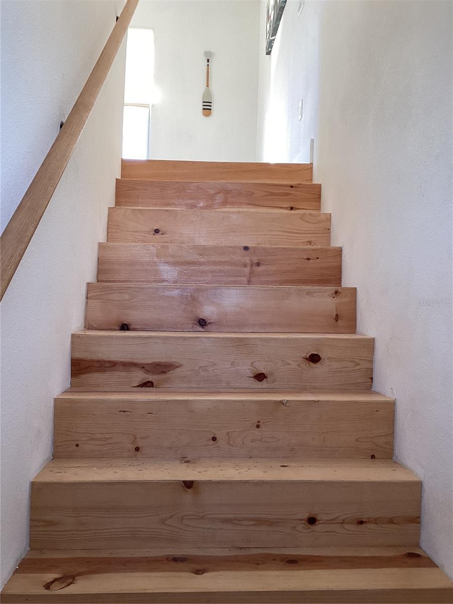 Stairs up to Primary Bedroom