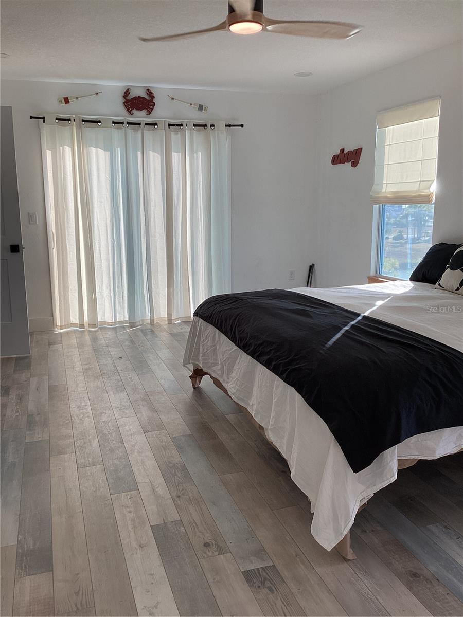 Primary Bedroom with Sliding Doors to Balcony