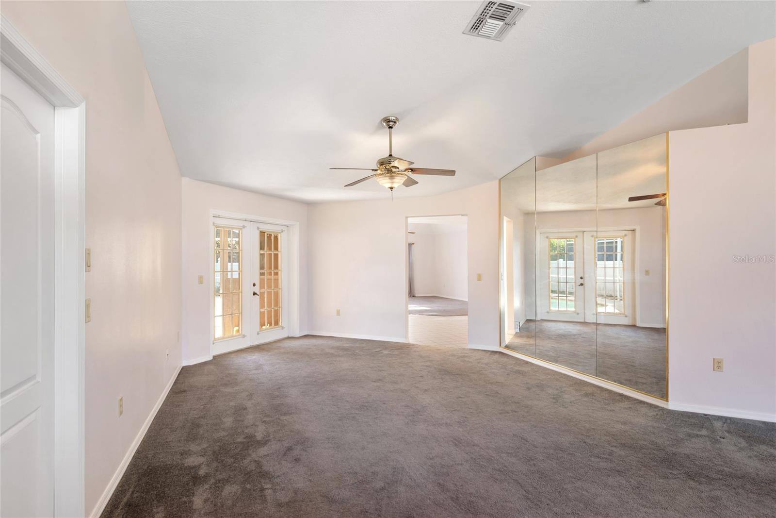 Living Room with access to the pool