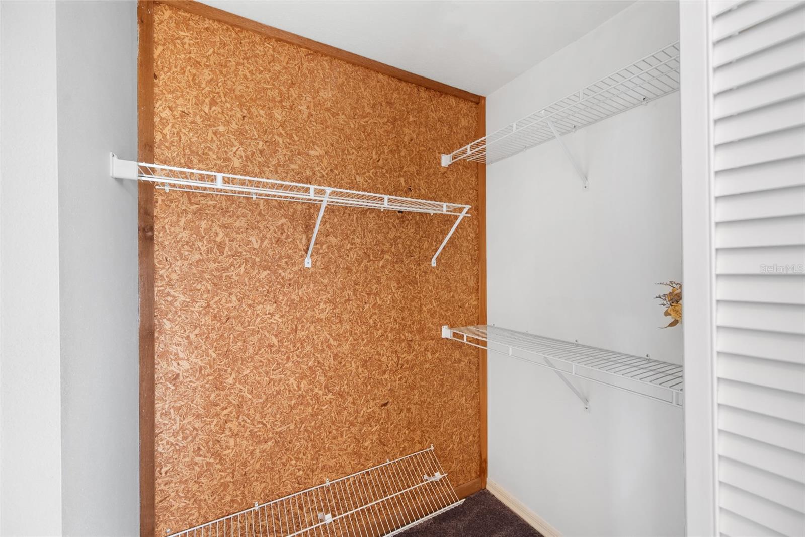 Cedar lined primary bedroom closet.