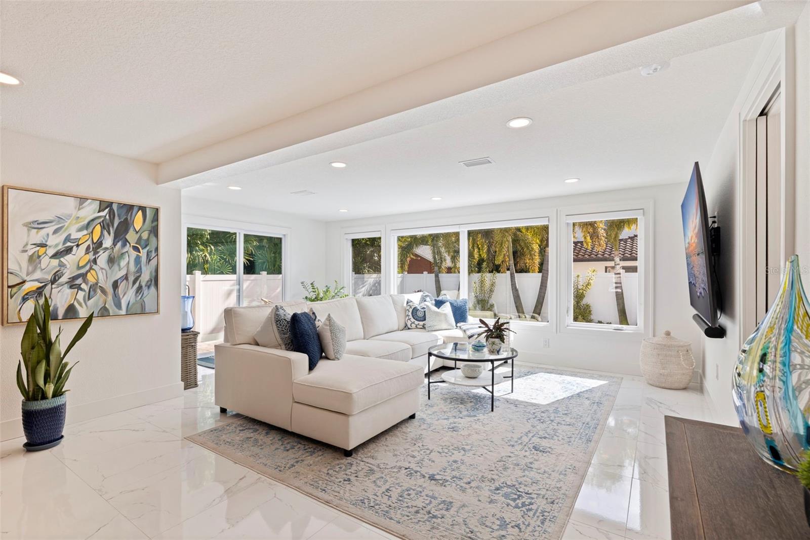 Large family room looking out over the pool