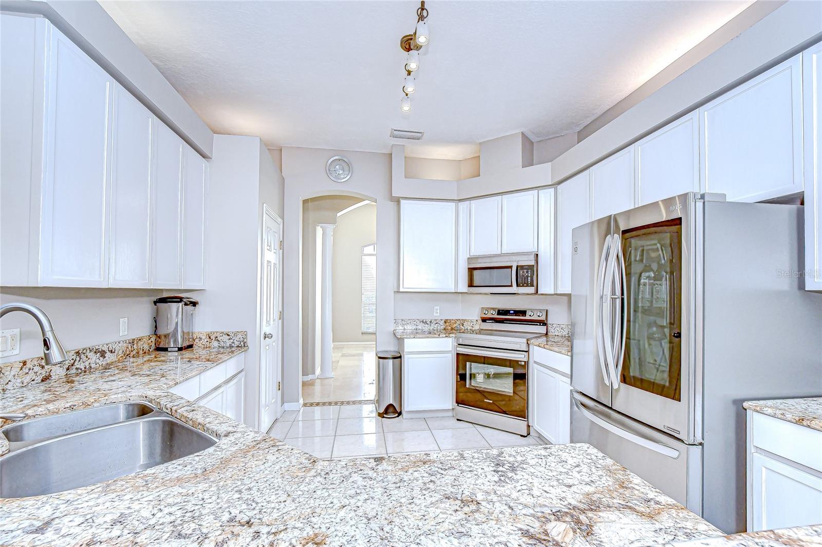 Granite countertops and stainless steel appliances—chef approved!