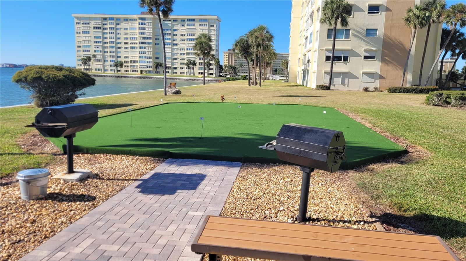 Putting green and barbeque grills